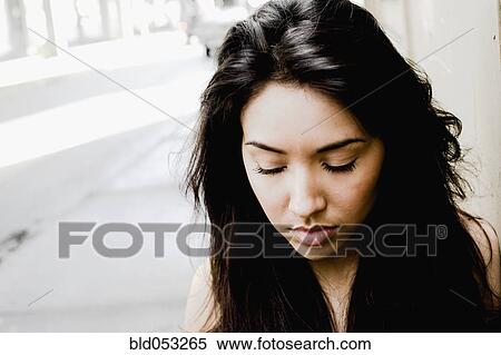 Stock Photography - Middle Eastern woman with eyes closed. Fotosearch