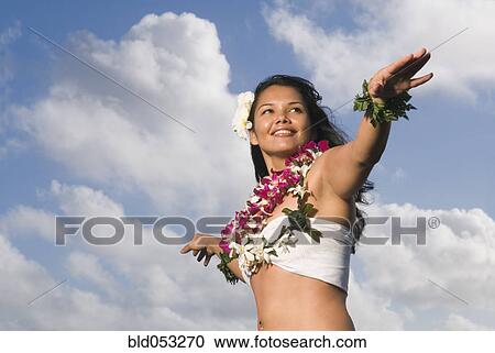 Pacific Islander woman in lei dancing View Large Photo Image Stock Image - Pacific Islander woman in lei dancing. Fotosearch
