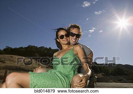 Portrait of couple wearing sunglasses View Large Photo Image Stock Photo - Portrait of couple wearing sunglasses. Fotosearch