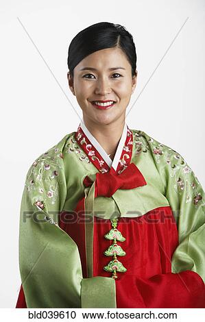 Stock Image - Portrait of Korean woman in traditional dress. Fotosearch