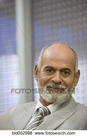 Portrait of senior African businessman View Large Photo Image Stock Photo - Portrait of senior African businessman. Fotosearch