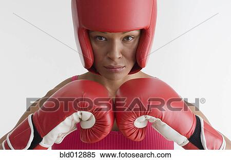 Stock Photography - Portrait of woman in boxing gear. Fotosearch