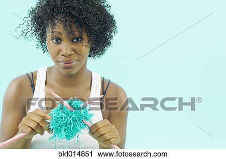 Portrait of woman with tangled yarn and knitting needles View Large Photo Image Stock Image - Portrait of woman with tangled yarn and knitting needles. Fotosearch