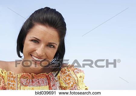 Portrait of young woman outdoors View Large Photo Image Stock Image - Portrait of young woman outdoors. Fotosearch