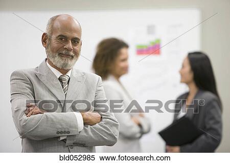 Senior African businessman with arms crossed View Large Photo Image Stock Photography - Senior African businessman with arms crossed. Fotosearch