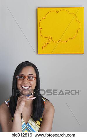 Smiling woman with empty thought balloon View Large Photo Image Stock Photograph - Smiling woman with empty thought balloon. Fotosearch