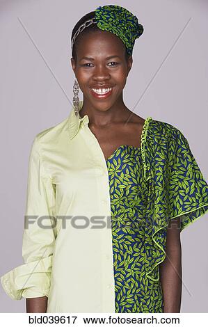 Ugandan woman wearing traditional dress and modern attire View Large Photo Image Stock Photo - Ugandan woman wearing traditional dress and modern attire. Fotosearch