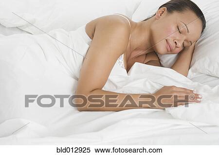 Woman asleep in bed View Large Photo Image Stock Photography - Woman asleep in bed. Fotosearch