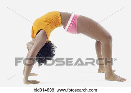 Stock Photo - Woman in crab walk position. Fotosearch