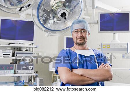Stock Image - Chilean surgeon in hospital operating room. Fotosearch