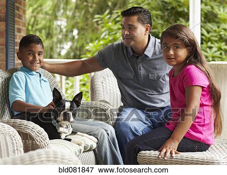 Father and children sitting on porch with dog View Large Photo Image Stock Photo - Father and children sitting on porch with dog. Fotosearch
