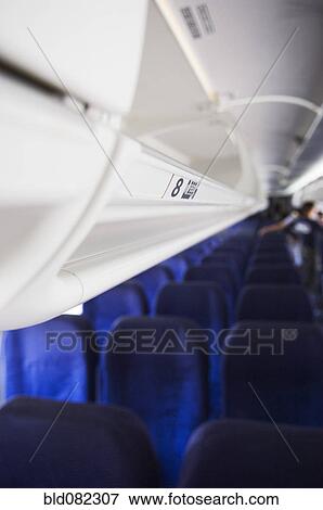 Inside of commercial airplane View Large Photo Image Stock Photo - Inside of commercial airplane. Fotosearch