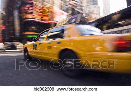 Speeding taxi in city View Large Photo Image Stock Photo - Speeding taxi in city. Fotosearch