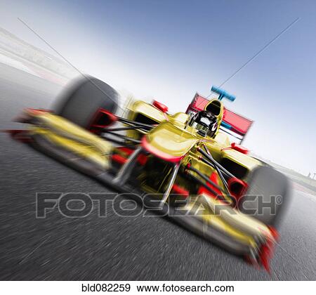 Speeding yellow race car View Large Photo Image Stock Photo - Speeding yellow race car. Fotosearch