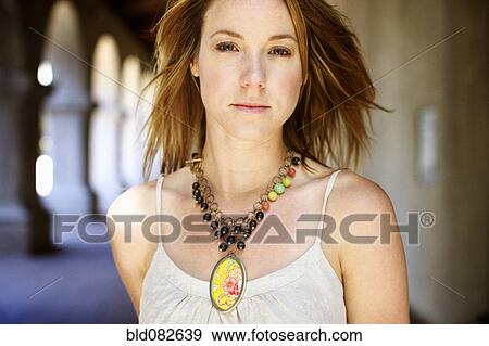 Stock Photo - Caucasian woman wearing necklace. Fotosearch