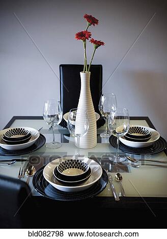 Stock Photo - Elegant tablewear on dining room table. Fotosearch