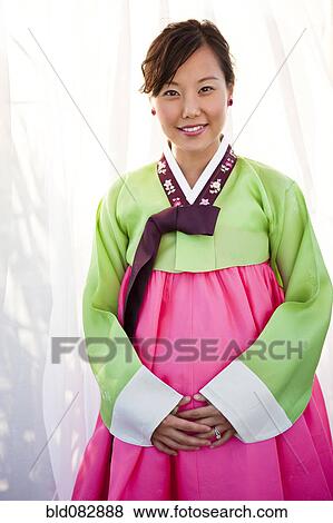Stock Photo - Korean woman in traditional clothing. Fotosearch