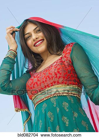 Mixed race woman in traditional Indian clothing View Large Photo Image Picture - Mixed race woman in traditional Indian clothing. Fotosearch