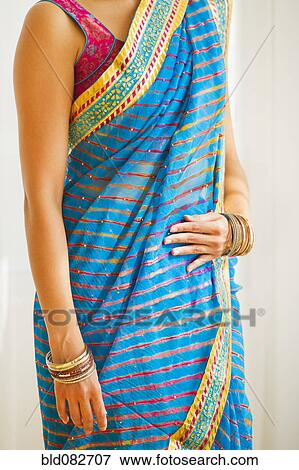 Mixed race woman in traditional Indian clothing View Large Photo Image Stock Photo - Mixed race woman in traditional Indian clothing. Fotosearch