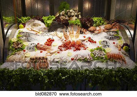 Seafood displayed on ice View Large Photo Image Stock Image - Seafood displayed on ice. Fotosearch