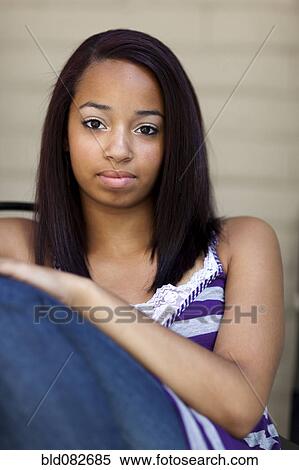 Stock Photography - Serious mixed race girl. Fotosearch