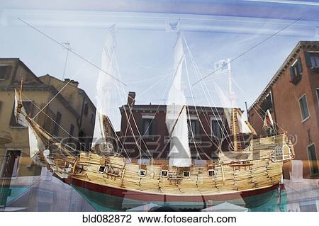Wooden ship model behind glass View Large Photo Image Stock Image - Wooden ship model behind glass. Fotosearch