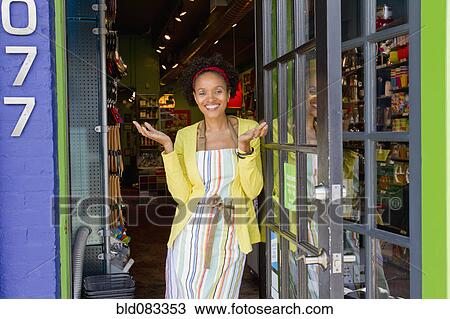 African American small business owner standing in doorway View Large Photo Image Stock Image - African American small business owner standing in doorway. Fotosearch
