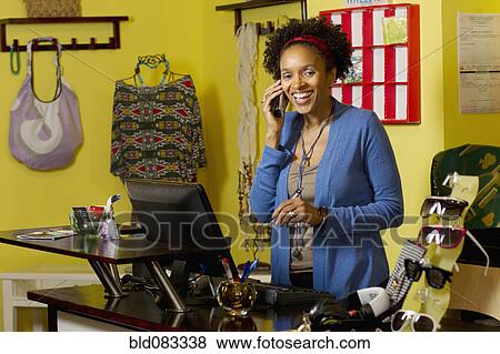 African American small business owner in clothing shop View Large Photo Image Stock Photo - African American small business owner in clothing shop. Fotosearch