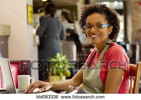 African American small business owner in shop View Large Photo Image Stock Photograph - African American small business owner in shop. Fotosearch