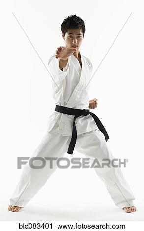 Asian male black belt practicing karate View Large Photo Image Stock Image - Asian male black belt practicing karate. Fotosearch