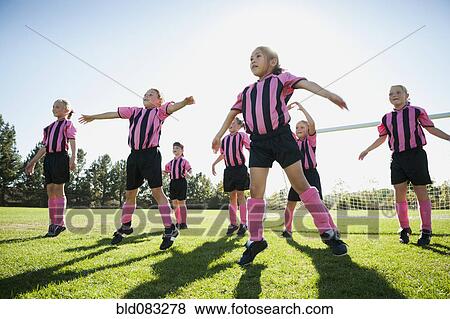 Caucasian girls warming up for soccer game View Large Photo Image Stock Photo - Caucasian girls warming up for soccer game. Fotosearch