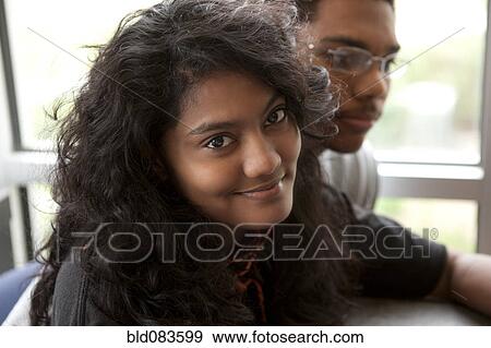 Stock Photo - Couple hanging out in cafe. Fotosearch
