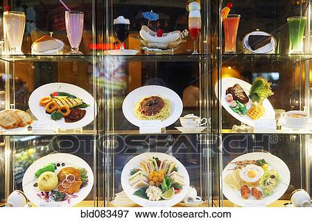 Stock Photo - Display case with menu items in restaurant. Fotosearch
