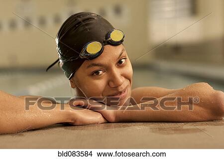 Picture - Pacific Islander swimmer in swimming pool. Fotosearch