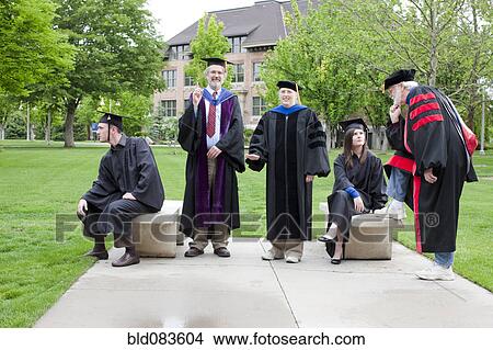 Picture - Professors and students waiting for graduation. Fotosearch