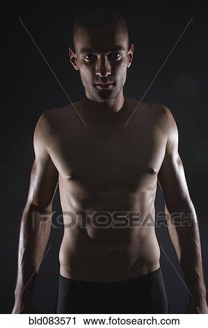 Serious mixed race, bare chested athlete View Large Photo Image Stock Image - Serious mixed race, bare chested athlete. Fotosearch