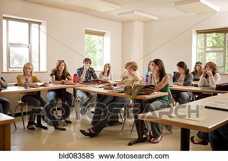 Stock Photography - Students studying in classroom. Fotosearch