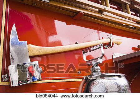 Axe on side of fire truck View Large Photo Image Picture - Axe on side of fire truck. Fotosearch