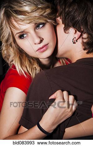 Caucasian couple hugging View Large Photo Image Stock Image - Caucasian couple hugging. Fotosearch