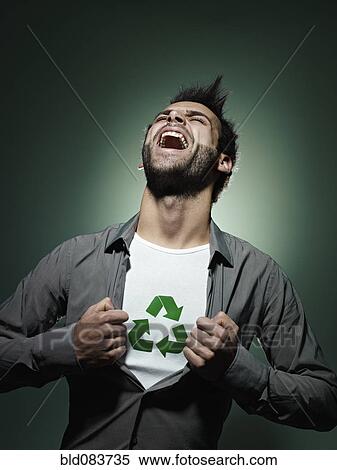 Stock Photography - Caucasian man with recycling symbol in his shirt. Fotosearch