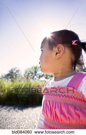 Curious Chinese girl View Large Photo Image Stock Image - Curious Chinese girl. Fotosearch