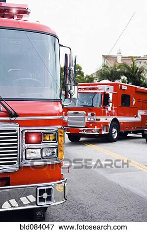Emergency vehicles responding to emergency View Large Photo Image Stock Photo - Emergency vehicles responding to emergency. Fotosearch
