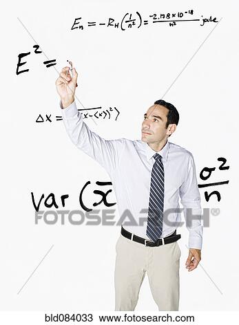 Hispanic businessman writing formula on clear board View Large Photo Image Stock Image - Hispanic businessman writing formula on clear board. Fotosearch