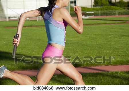 Japanese relay runner running with baton View Large Photo Image Stock Photograph - Japanese relay runner running with baton. Fotosearch