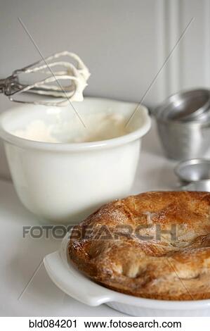 Baking ingredients and homemade apple pie View Large Photo Image Stock Image - Baking ingredients and homemade apple pie. Fotosearch
