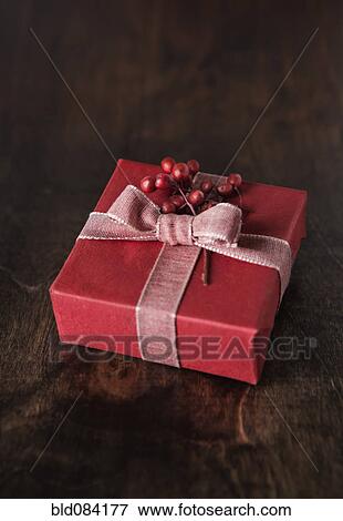 Berries on Christmas gift View Large Photo Image Stock Photo - Berries on Christmas gift. Fotosearch