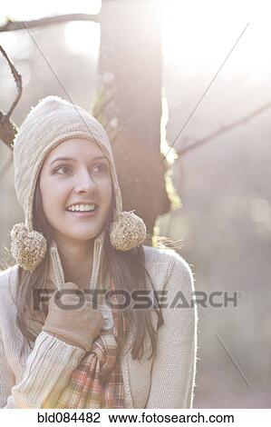 Mixed race woman in cap, scarf and gloves View Large Photo Image Stock Image - Mixed race woman in cap, scarf and gloves. Fotosearch
