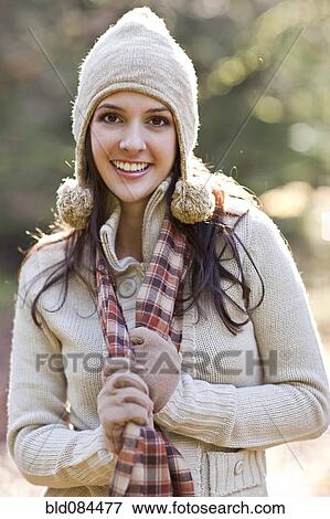 Mixed race woman in cap, scarf and gloves View Large Photo Image Stock Photo - Mixed race woman in cap, scarf and gloves. Fotosearch