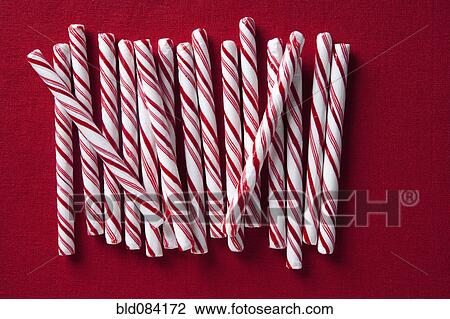Stock Image - Row of candy canes. Fotosearch