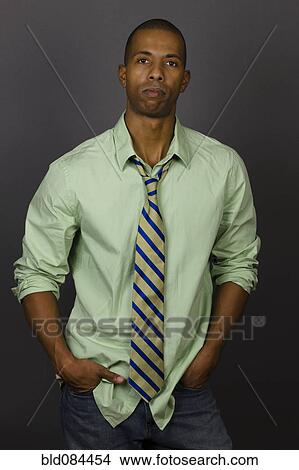 Picture - Serious African American man wearing shirt and tie. Fotosearch